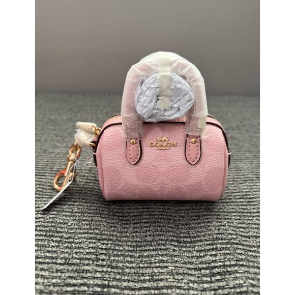 COACH Powder Pink Mini Rowan Bag Charm in Signature Canvas - Picture 1 of 5